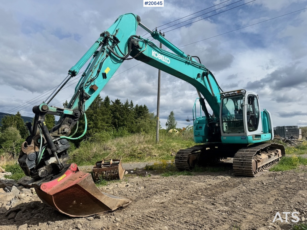 Kobelco SK235SR - Kotrógép: 1 kép. Kobelco SK235SR - Kotrógép: 1 kép.