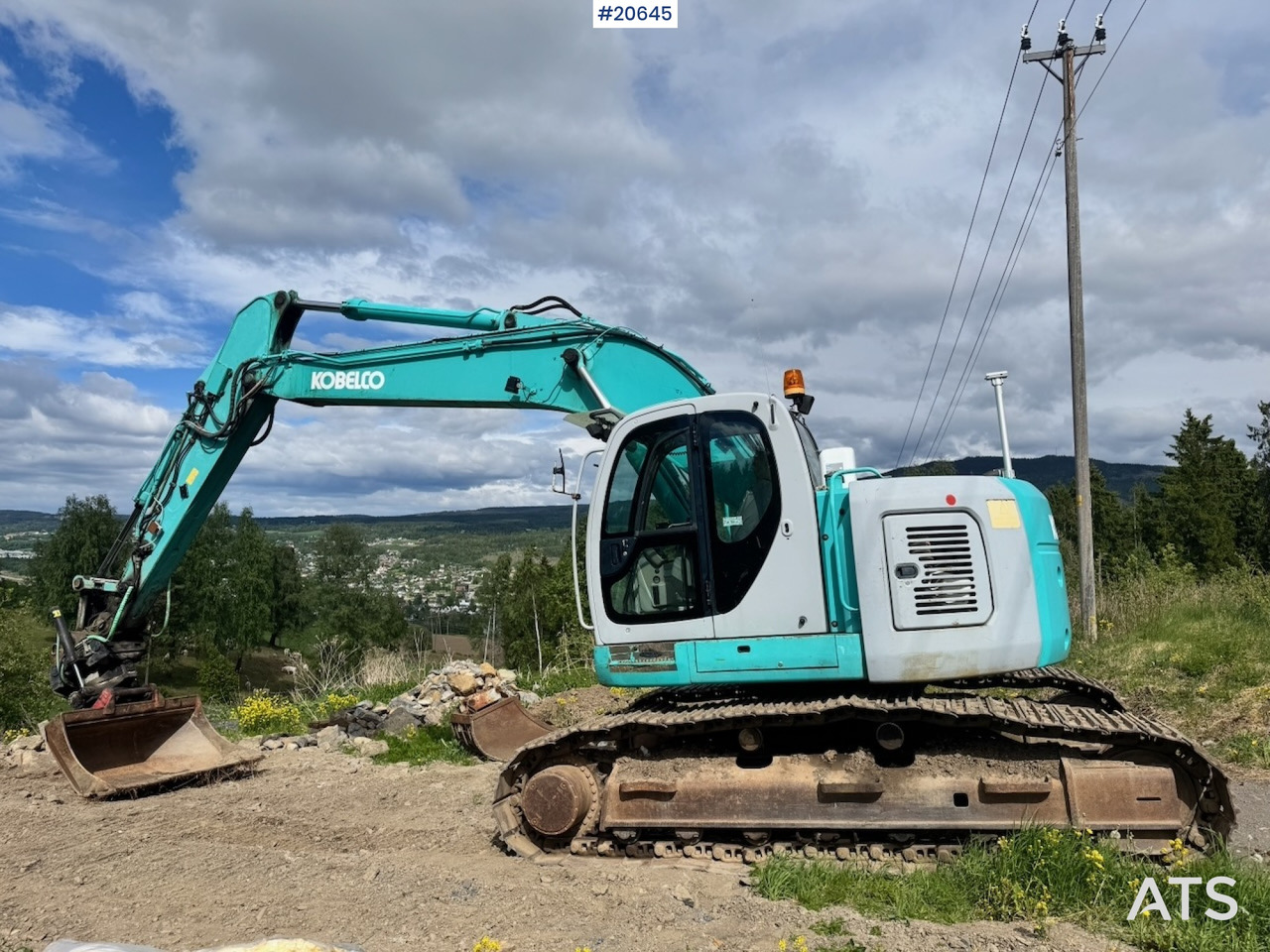 Kobelco SK235SR - Kotrógép: 2 kép. Kobelco SK235SR - Kotrógép: 2 kép.