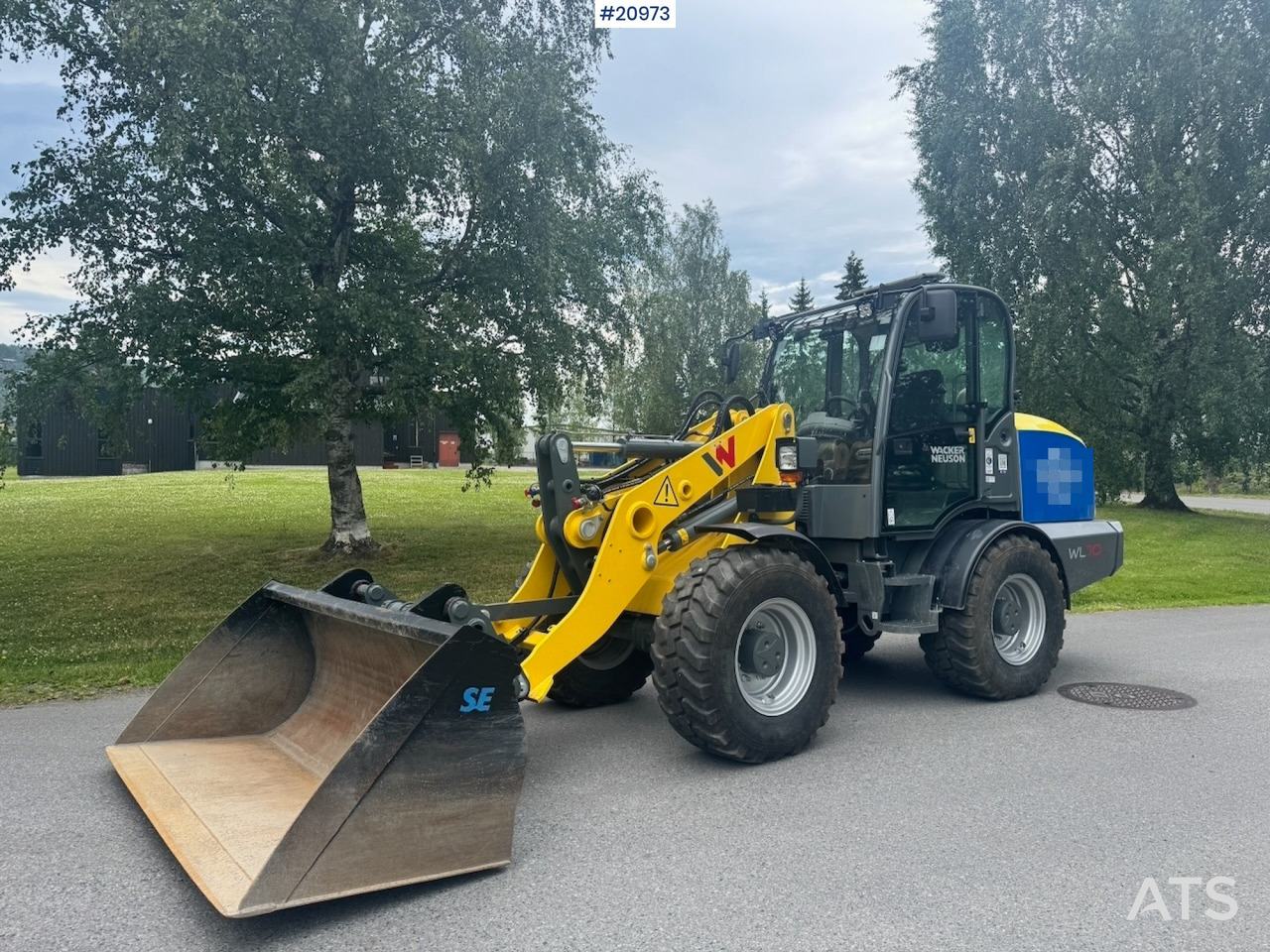 Wacker Neuson RL70 - Gumikerekes homlokrakodó: 2 kép. Wacker Neuson RL70 - Gumikerekes homlokrakodó: 2 kép.