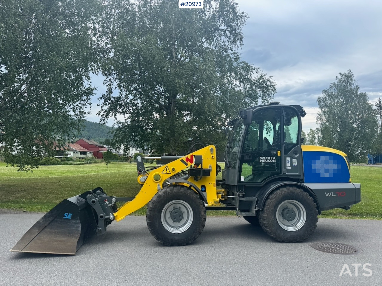 Wacker Neuson RL70 - Gumikerekes homlokrakodó: 3 kép. Wacker Neuson RL70 - Gumikerekes homlokrakodó: 3 kép.