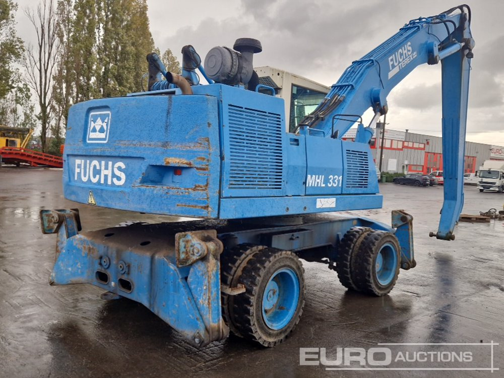 2004 Fuchs MHL331 - Gumikerekes kotró: 5 kép. 2004 Fuchs MHL331 - Gumikerekes kotró: 5 kép.