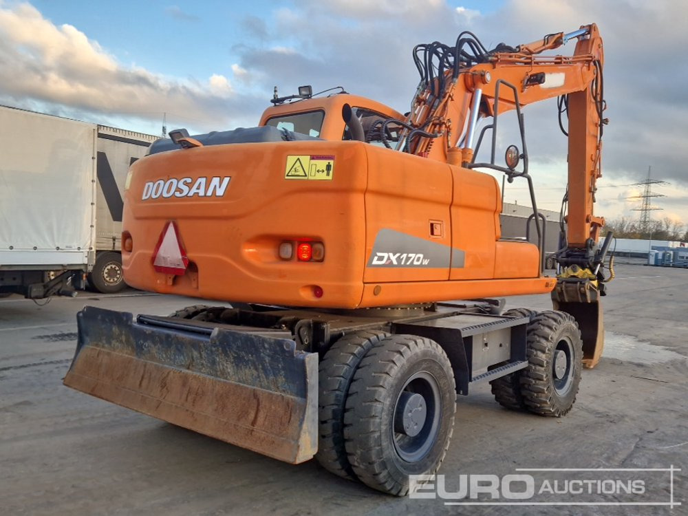 2010 Doosan DX170W - Gumikerekes kotró: 5 kép. 2010 Doosan DX170W - Gumikerekes kotró: 5 kép.