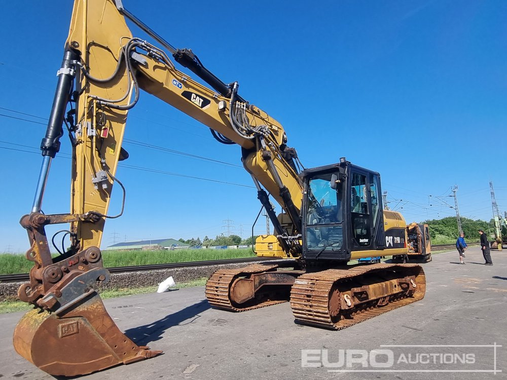 2011 CAT 319D LVA - Lánctalpas kotró: 1 kép. 2011 CAT 319D LVA - Lánctalpas kotró: 1 kép.
