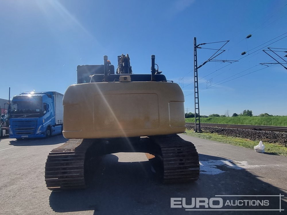 2011 CAT 319D LVA - Lánctalpas kotró: 4 kép. 2011 CAT 319D LVA - Lánctalpas kotró: 4 kép.