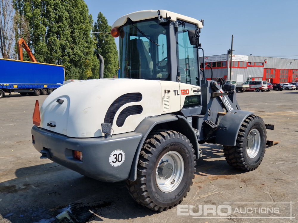 2011 Terex TL120 - Gumikerekes homlokrakodó: 5 kép. 2011 Terex TL120 - Gumikerekes homlokrakodó: 5 kép.