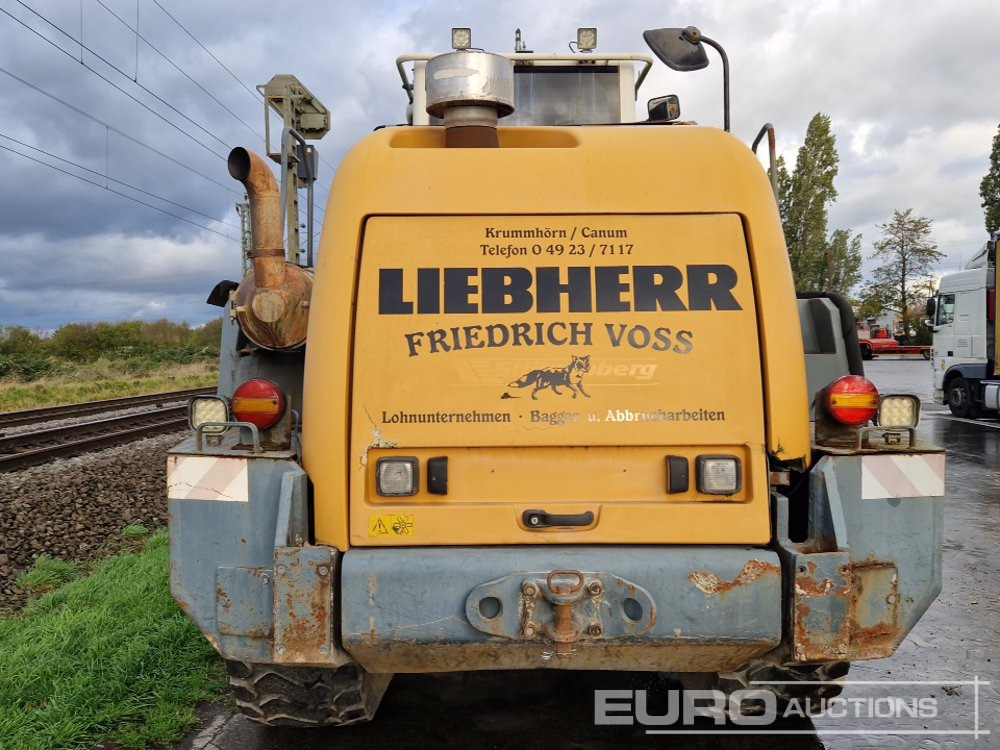 2012 Liebherr L550 - Gumikerekes homlokrakodó: 4 kép. 2012 Liebherr L550 - Gumikerekes homlokrakodó: 4 kép.