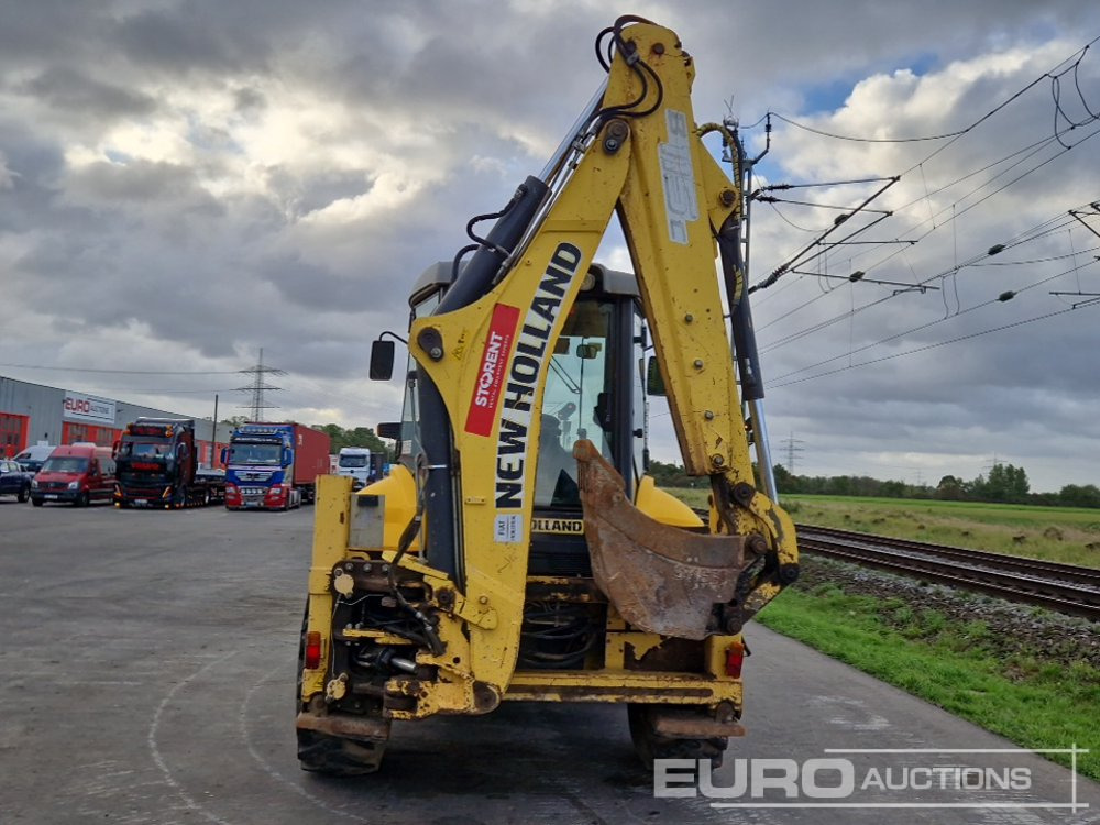 2012 New Holland B115C - Kotrórakodó: 4 kép. 2012 New Holland B115C - Kotrórakodó: 4 kép.