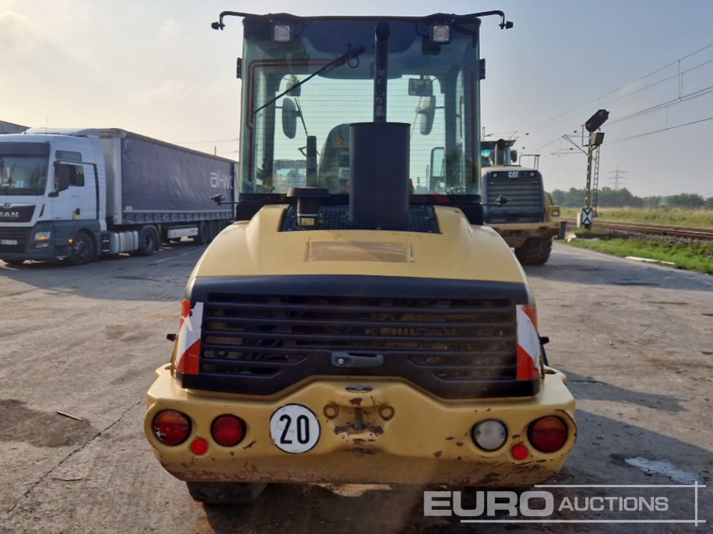 2013 CAT 907H2 - Gumikerekes homlokrakodó: 4 kép. 2013 CAT 907H2 - Gumikerekes homlokrakodó: 4 kép.