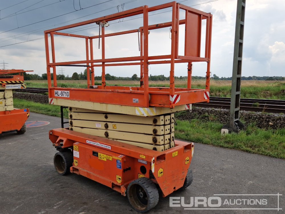 2014 Holland Lift ECOSTAR HL-9710 Diesel Scissor Lift, 12m Working Height, 325kg Platform Capacity, Extending Deck - Emelő: 3 kép. 2014 Holland Lift ECOSTAR HL-9710 Diesel Scissor Lift, 12m Working Height, 325kg Platform Capacity, Extending Deck - Emelő: 3 kép.