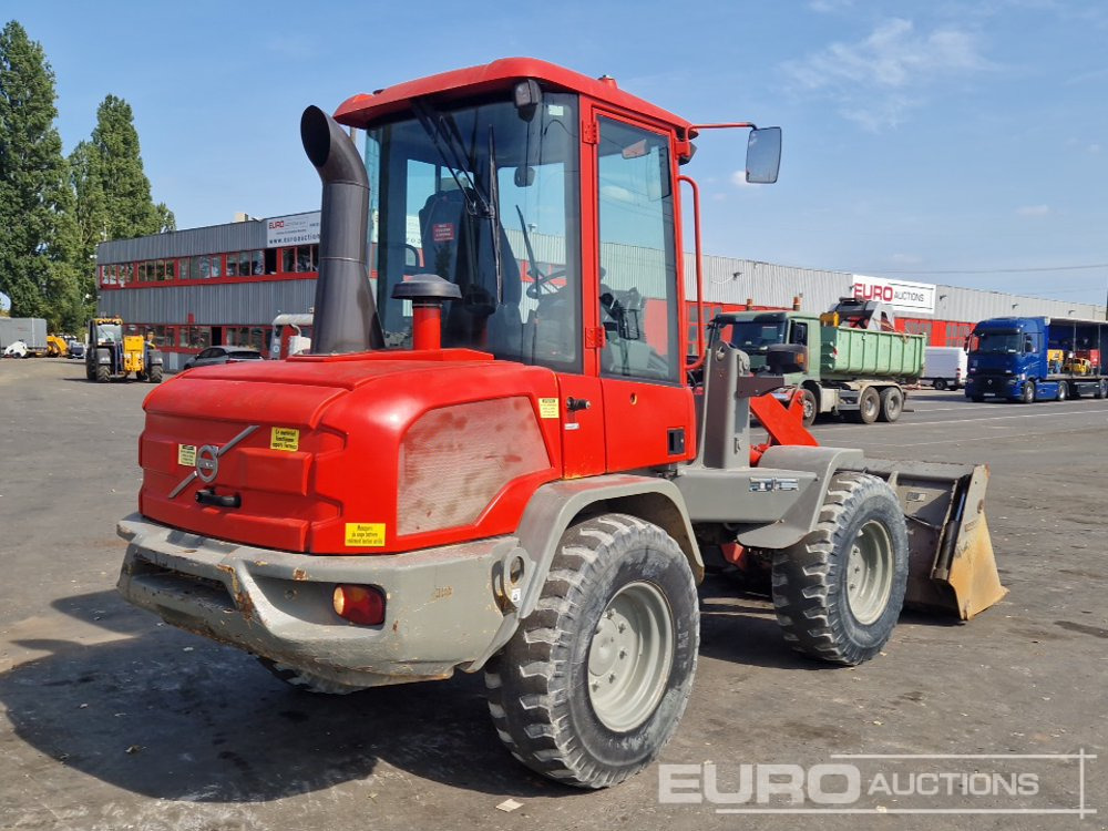2014 Volvo L30G - Gumikerekes homlokrakodó: 5 kép. 2014 Volvo L30G - Gumikerekes homlokrakodó: 5 kép.