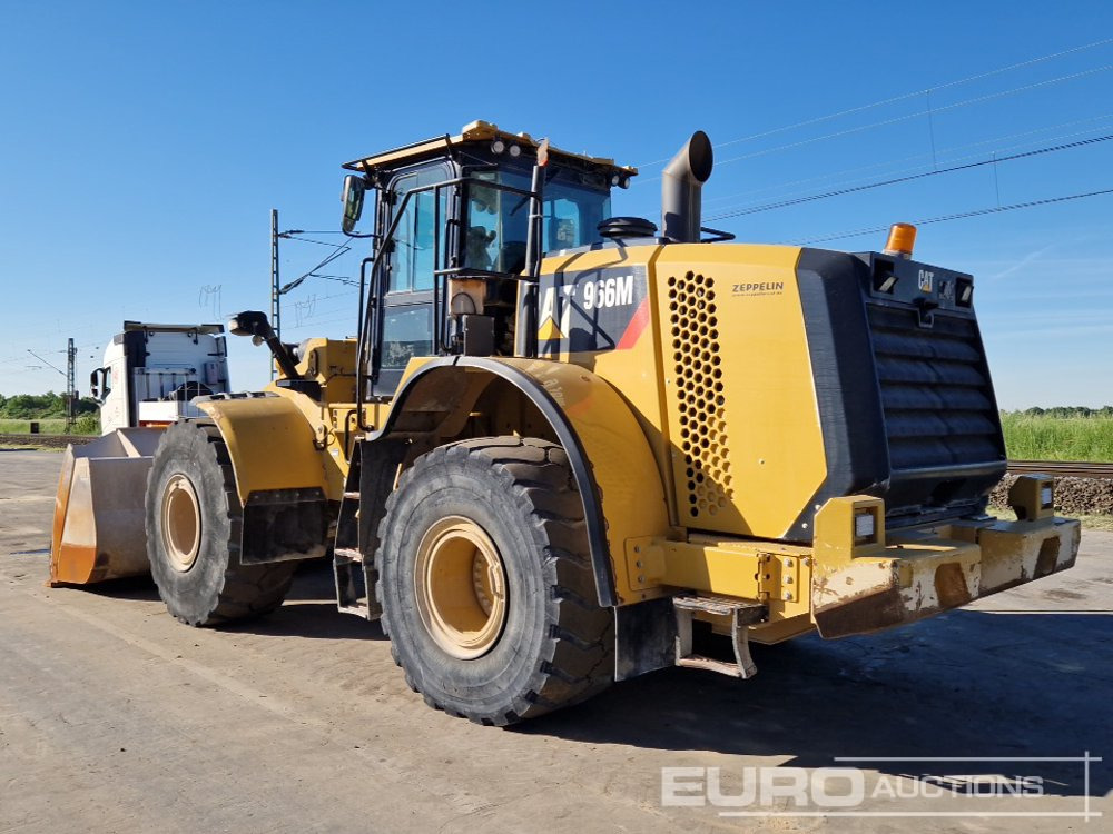 2015 CAT 966M - Gumikerekes homlokrakodó: 3 kép. 2015 CAT 966M - Gumikerekes homlokrakodó: 3 kép.