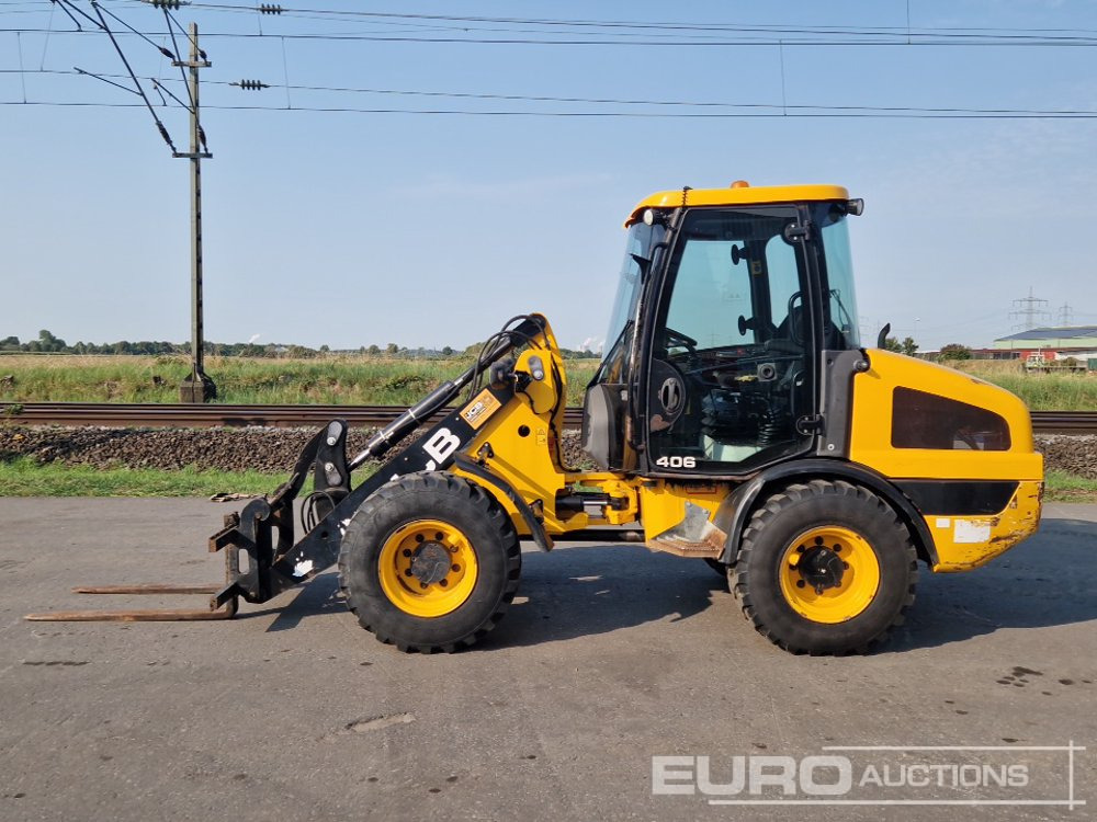 2015 JCB 406 - Gumikerekes homlokrakodó: 2 kép. 2015 JCB 406 - Gumikerekes homlokrakodó: 2 kép.