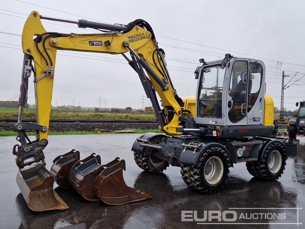 2019 Wacker Neuson EW100 - Gumikerekes kotró: 1 kép. 2019 Wacker Neuson EW100 - Gumikerekes kotró: 1 kép.