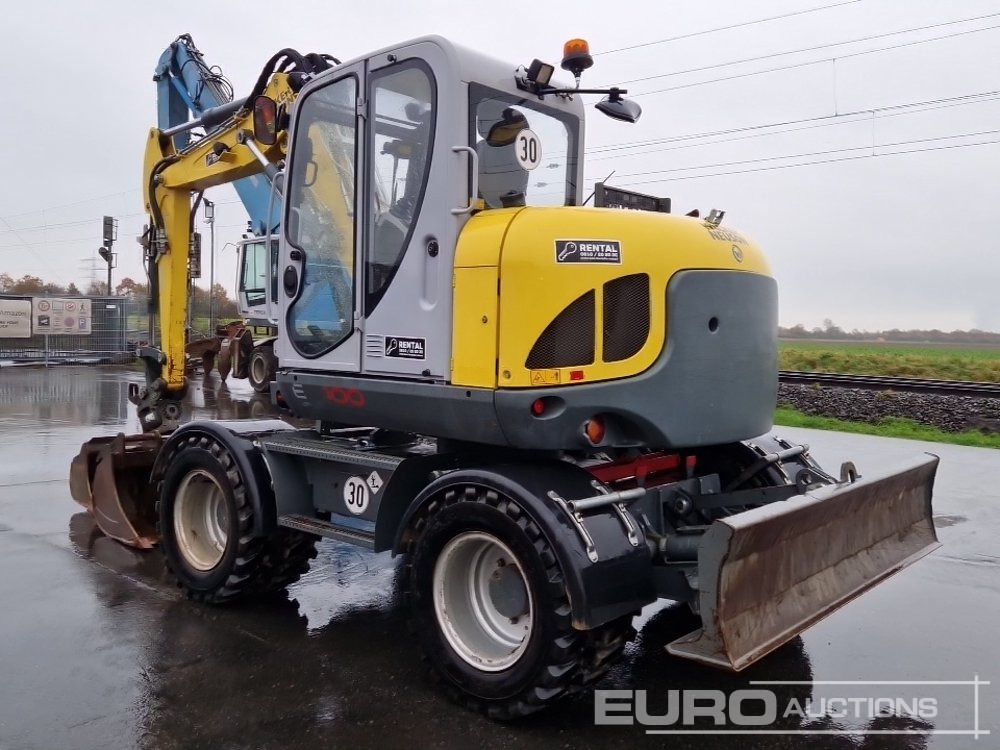 2019 Wacker Neuson EW100 - Gumikerekes kotró: 3 kép. 2019 Wacker Neuson EW100 - Gumikerekes kotró: 3 kép.
