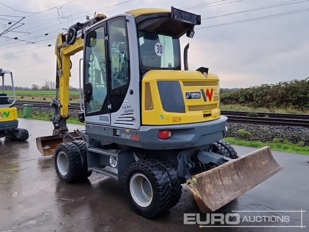 2019 Wacker Neuson EW65 - Gumikerekes kotró: 3 kép. 2019 Wacker Neuson EW65 - Gumikerekes kotró: 3 kép.