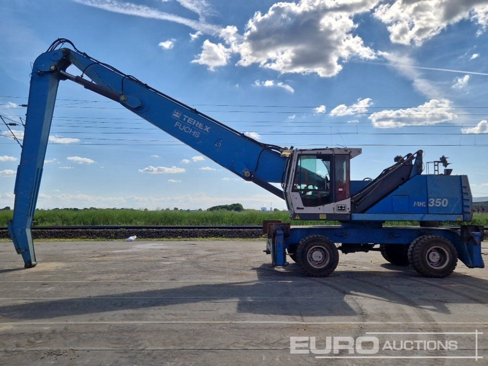 Fuchs MHL350 - Gumikerekes kotró: 3 kép. Fuchs MHL350 - Gumikerekes kotró: 3 kép.