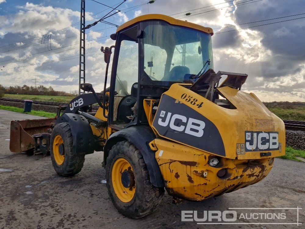 JCB 409B - Gumikerekes homlokrakodó: 3 kép. JCB 409B - Gumikerekes homlokrakodó: 3 kép.