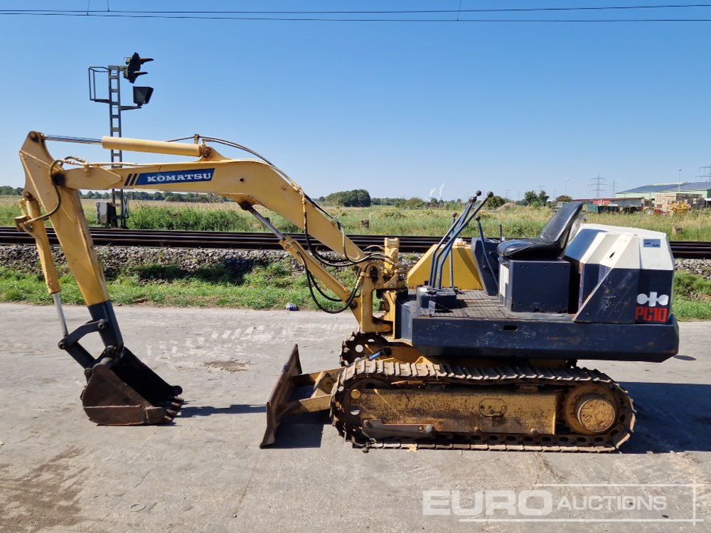 Komatsu PC10-5 - Minikotró: 2 kép. Komatsu PC10-5 - Minikotró: 2 kép.