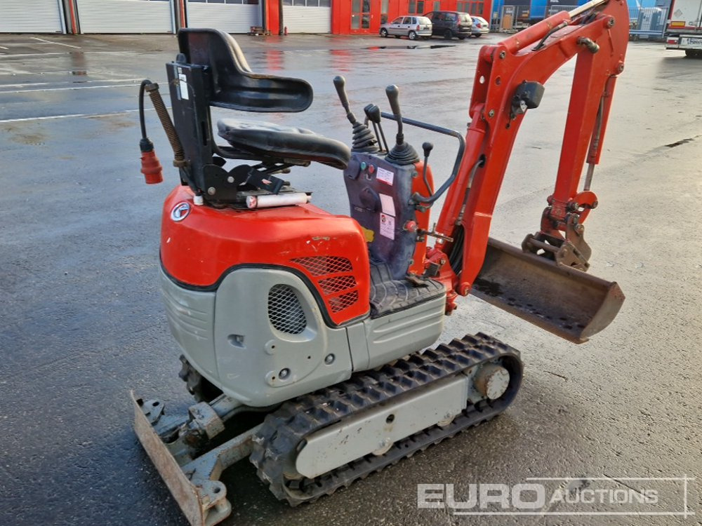 Kubota 008 - Minikotró: 4 kép. Kubota 008 - Minikotró: 4 kép.