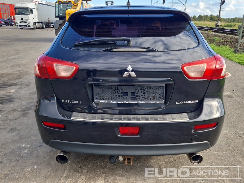 Mitsubishi Lancer - Autó: 4 kép. Mitsubishi Lancer - Autó: 4 kép.