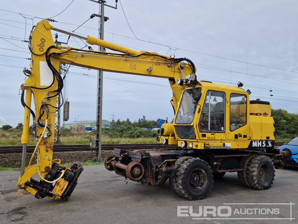 O & K MH5 S - Gumikerekes kotró: 1 kép. O & K MH5 S - Gumikerekes kotró: 1 kép.