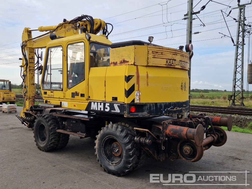 O & K MH5 S - Gumikerekes kotró: 3 kép. O & K MH5 S - Gumikerekes kotró: 3 kép.