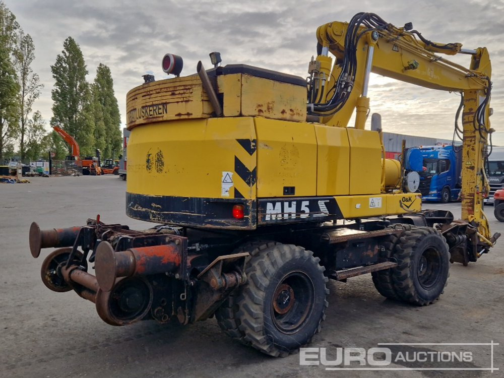 O & K MH5 S - Gumikerekes kotró: 5 kép. O & K MH5 S - Gumikerekes kotró: 5 kép.