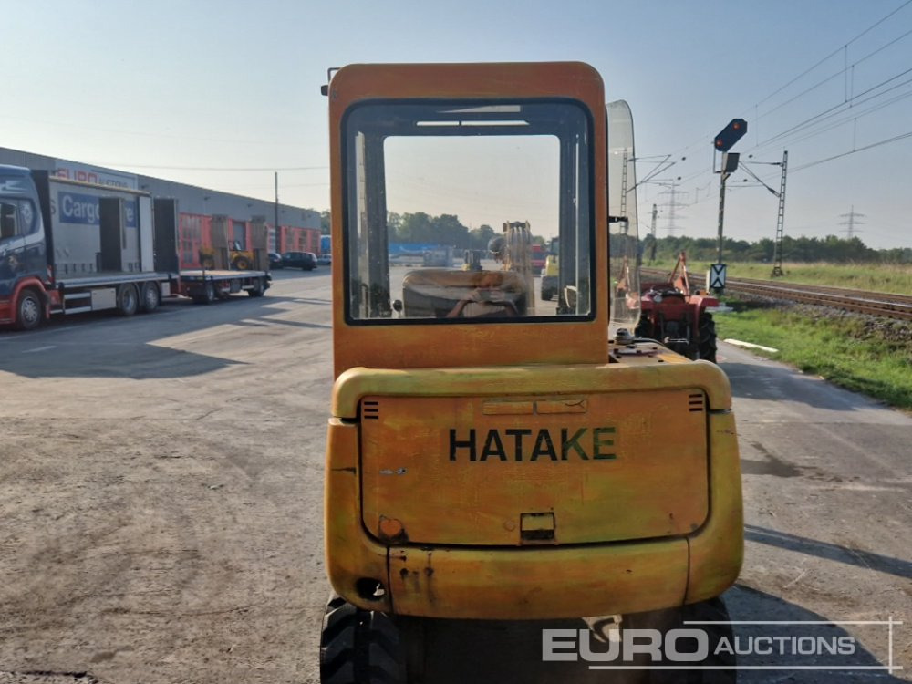Takeuchi TB025 - Minikotró: 4 kép. Takeuchi TB025 - Minikotró: 4 kép.