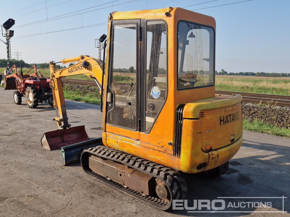 Takeuchi TB025 - Minikotró: 3 kép. Takeuchi TB025 - Minikotró: 3 kép.