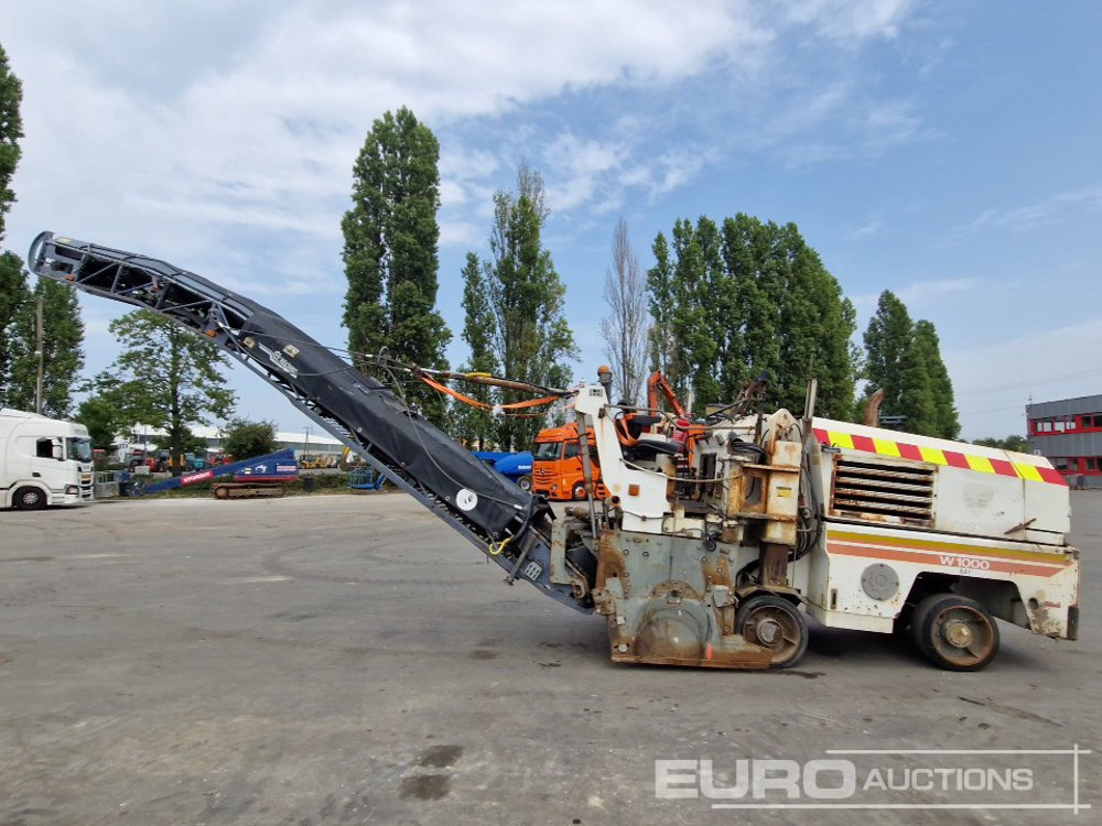 Wirtgen W1000 - Aszfaltmaró: 5 kép. Wirtgen W1000 - Aszfaltmaró: 5 kép.