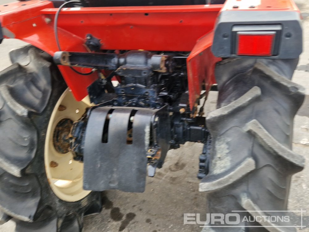 Kistraktor Yanmar F165D: 13 kép.