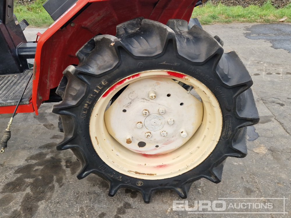 Kistraktor Yanmar F165D: 10 kép.