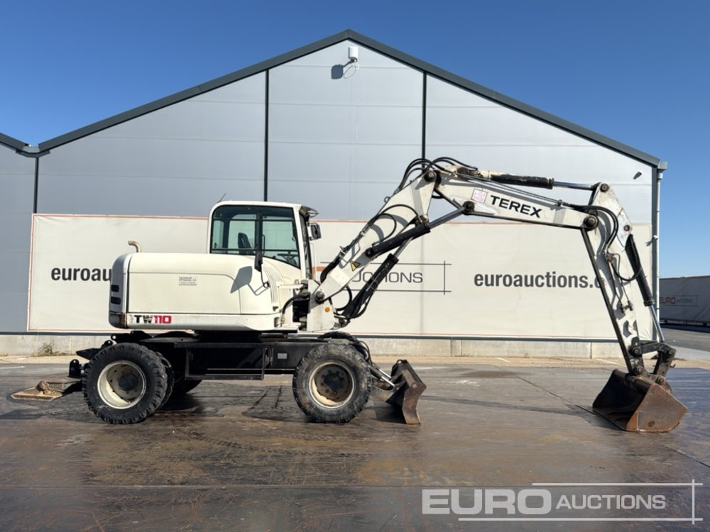 2008 Terex TW110 - Gumikerekes kotró: 2 kép. 2008 Terex TW110 - Gumikerekes kotró: 2 kép.