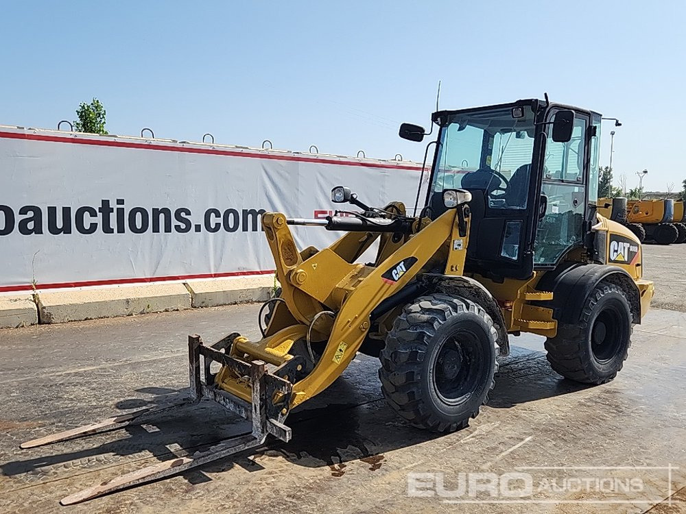 2010 CAT 908H - Gumikerekes homlokrakodó: 1 kép. 2010 CAT 908H - Gumikerekes homlokrakodó: 1 kép.