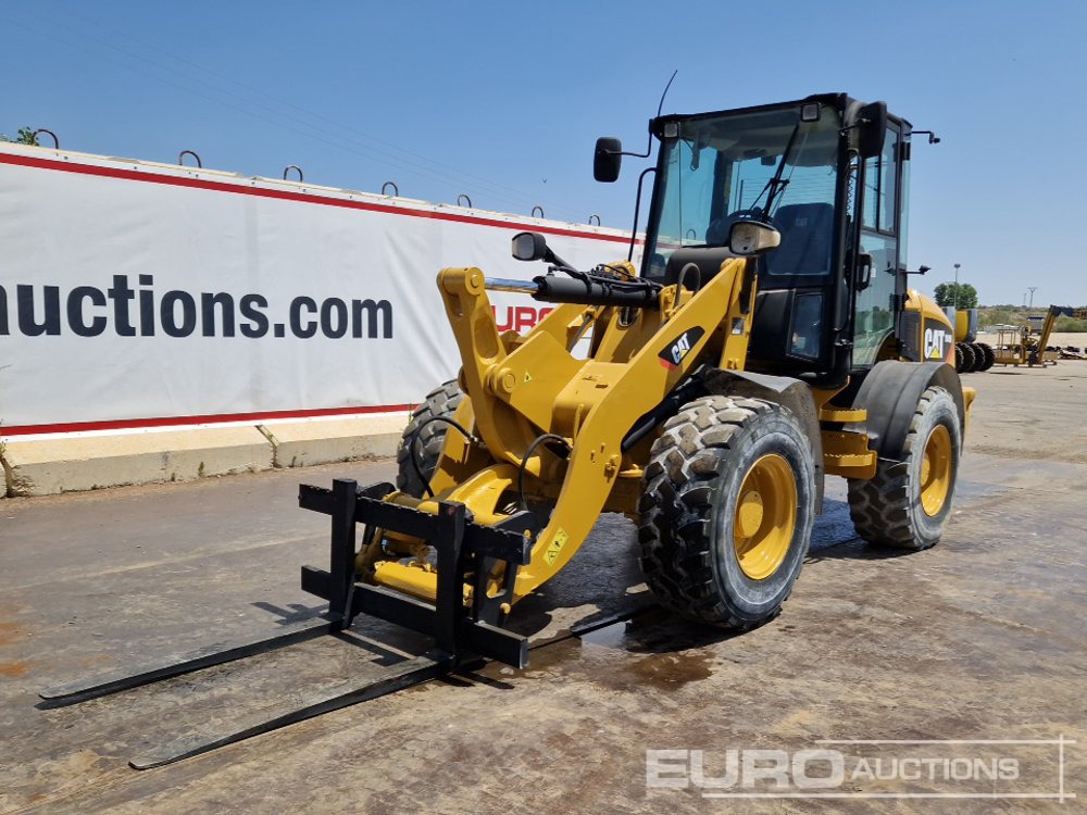 2010 CAT 908H - Gumikerekes homlokrakodó: 1 kép. 2010 CAT 908H - Gumikerekes homlokrakodó: 1 kép.