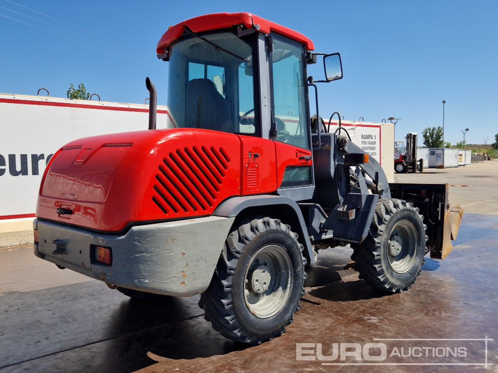 2011 Terex TL70 - Gumikerekes homlokrakodó: 5 kép. 2011 Terex TL70 - Gumikerekes homlokrakodó: 5 kép.