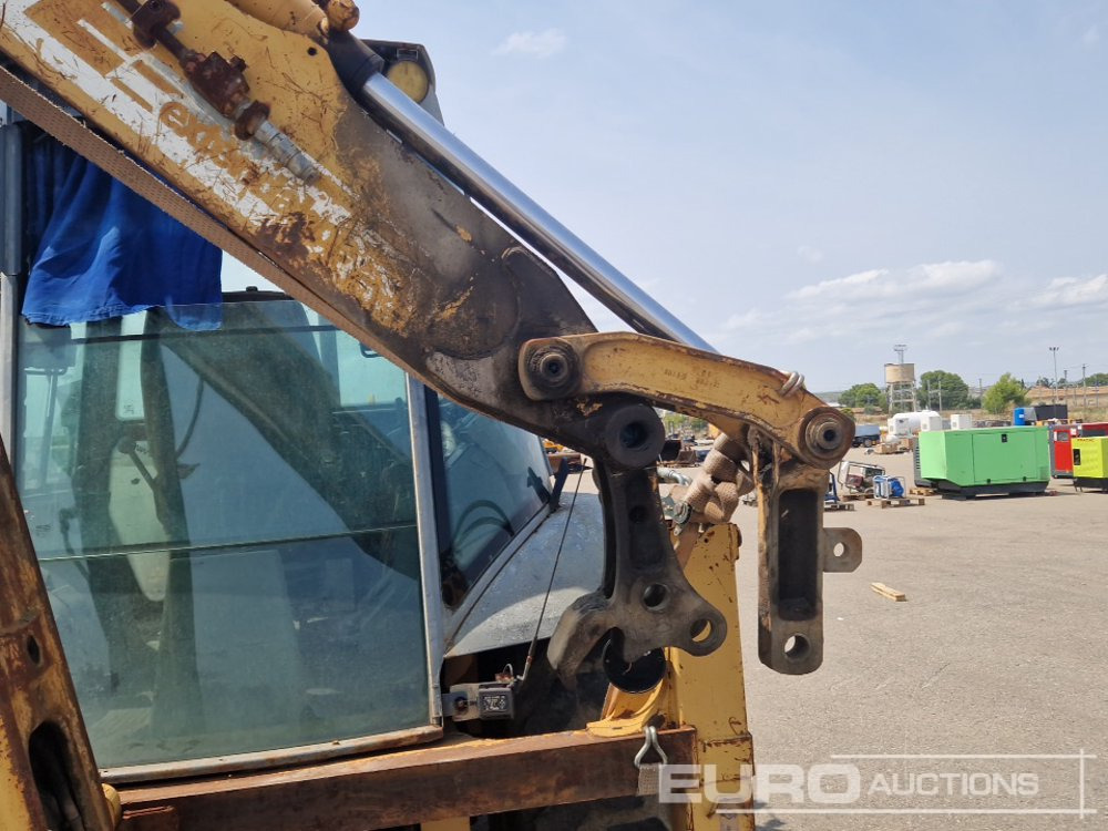 Kotrórakodó Case 580K: 23 kép.