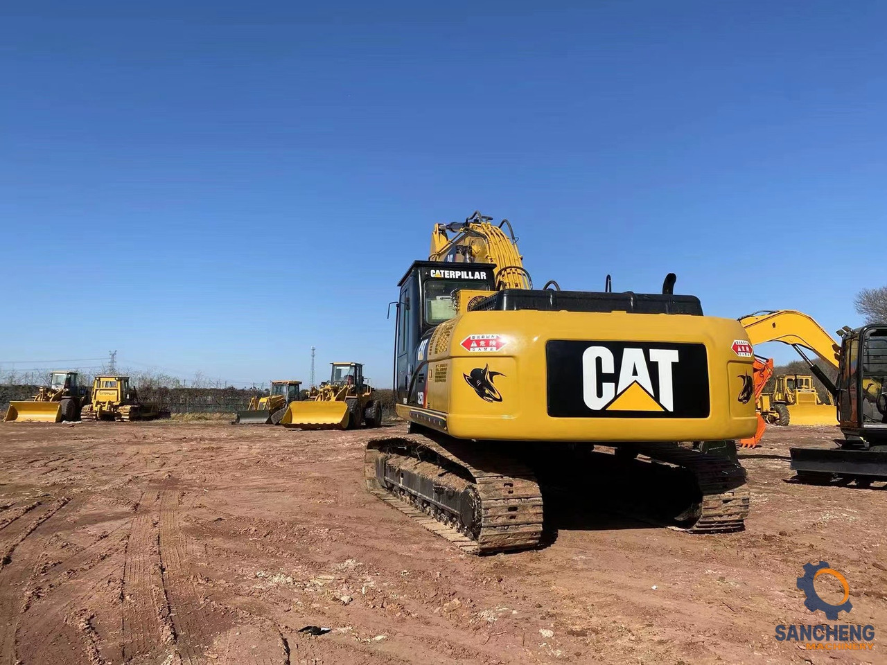 Kotrógép CAT 325D: 12 kép.