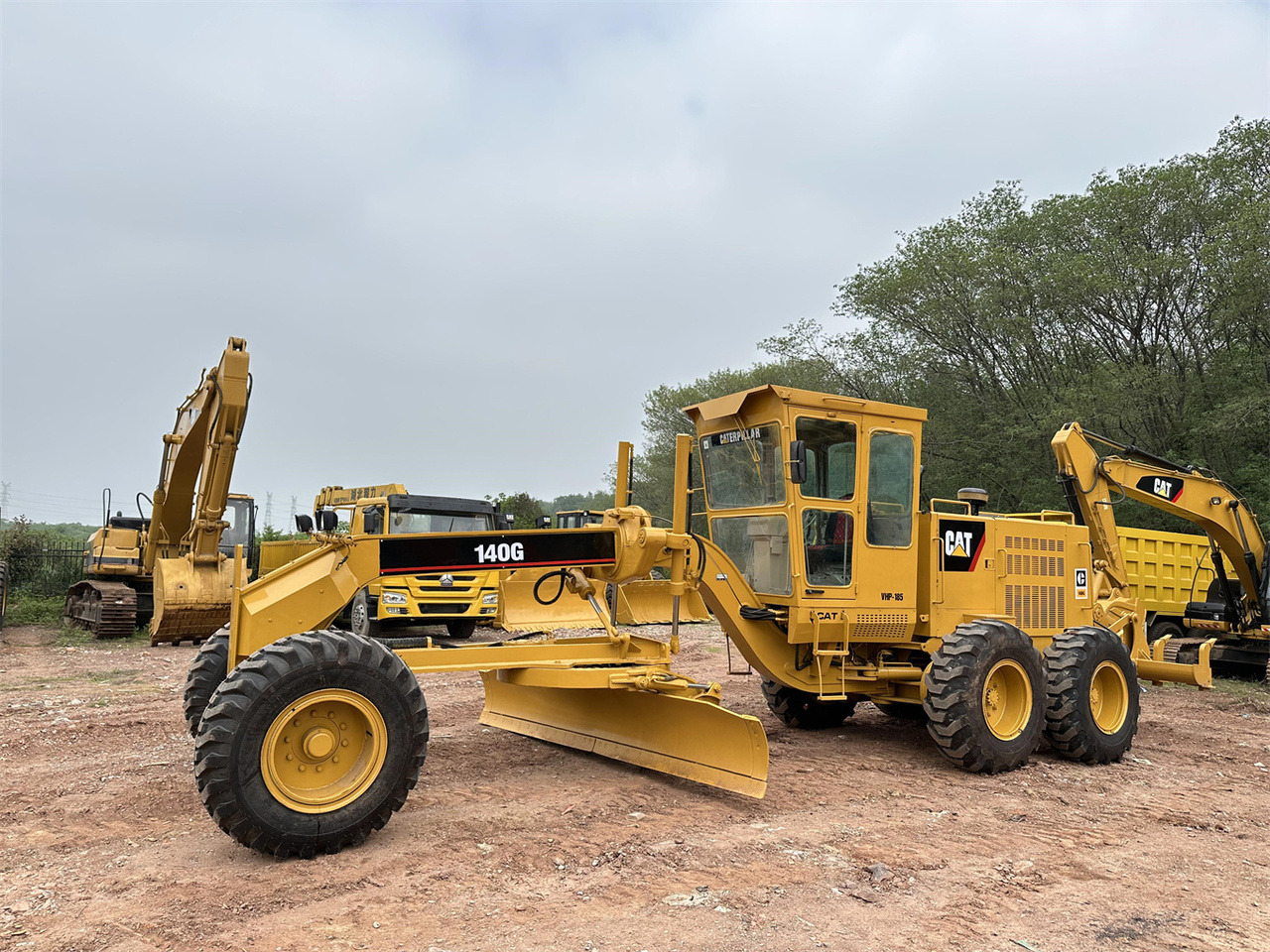 CATERPILLAR 140G - Gréder: 4 kép. CATERPILLAR 140G - Gréder: 4 kép.