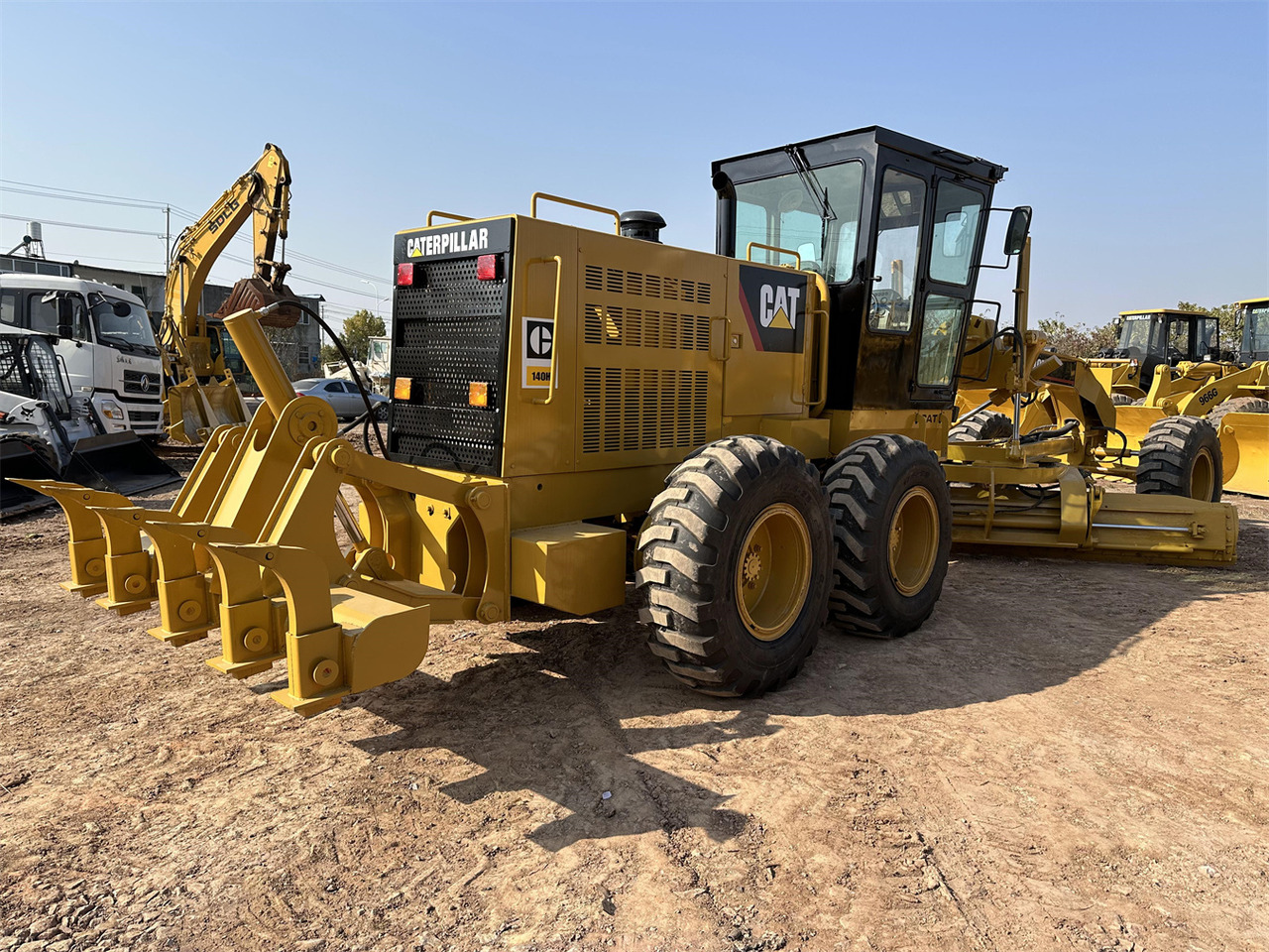 CATERPILLAR 140H - Gréder: 5 kép. CATERPILLAR 140H - Gréder: 5 kép.