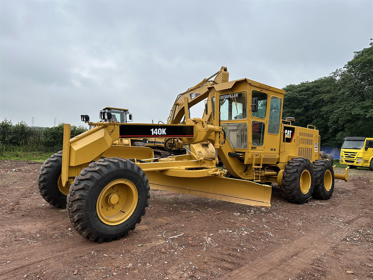 CATERPILLAR 140K - Gréder: 2 kép. CATERPILLAR 140K - Gréder: 2 kép.