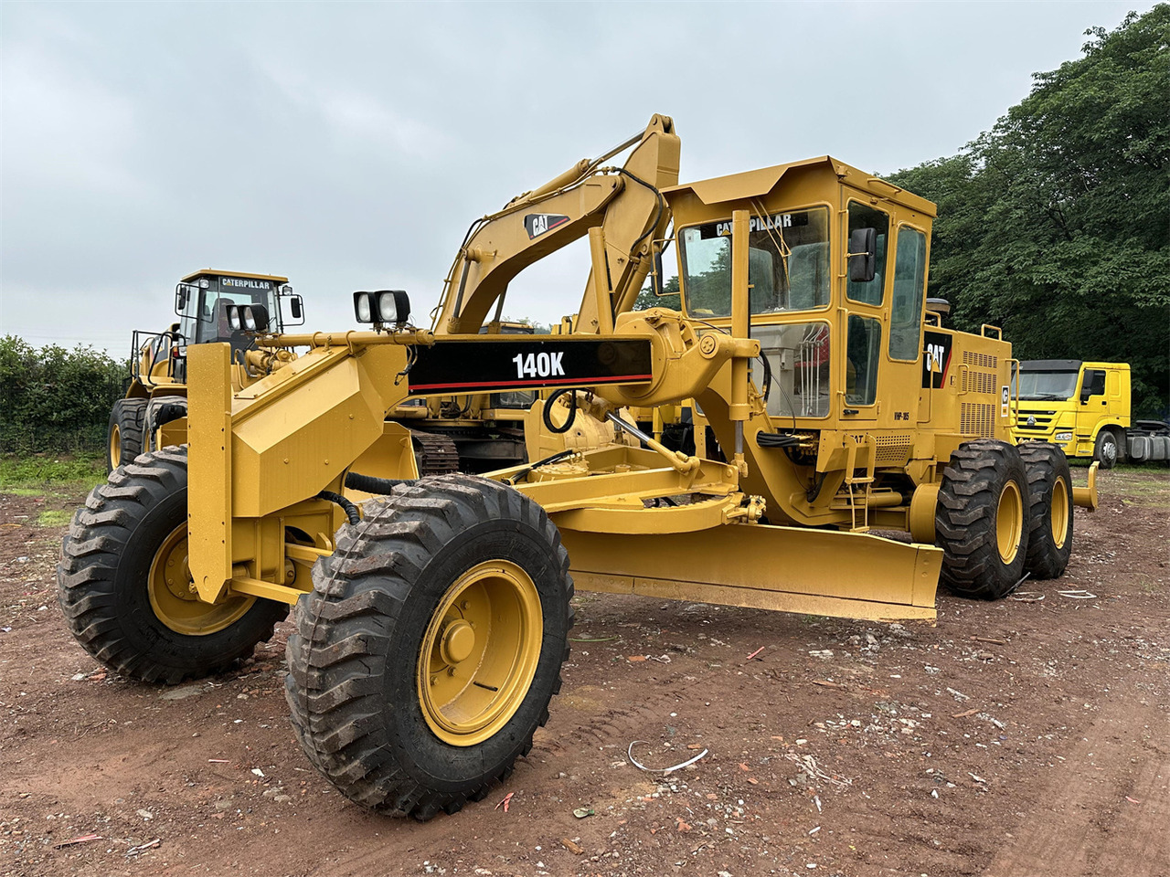 CATERPILLAR 140K - Gréder: 4 kép. CATERPILLAR 140K - Gréder: 4 kép.