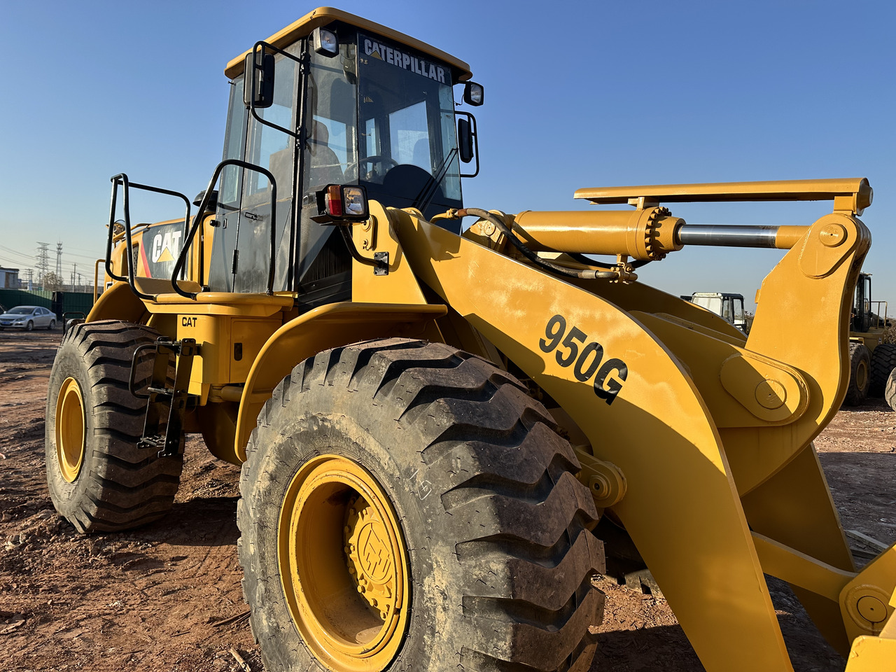 CATERPILLAR 950G - Gumikerekes homlokrakodó: 4 kép. CATERPILLAR 950G - Gumikerekes homlokrakodó: 4 kép.
