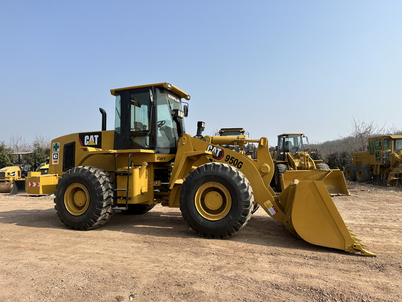 CATERPILLAR 950G - Gumikerekes homlokrakodó: 5 kép. CATERPILLAR 950G - Gumikerekes homlokrakodó: 5 kép.