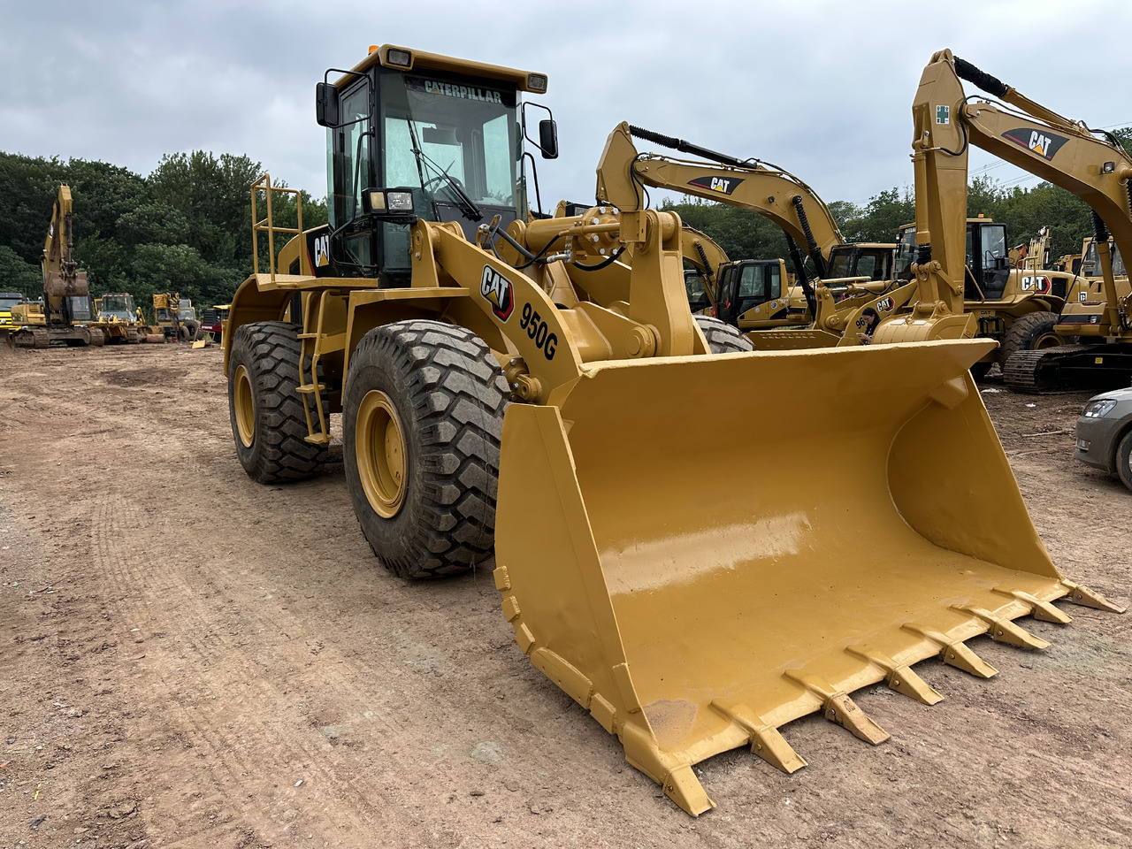 CATERPILLAR 950G - Gumikerekes homlokrakodó: 1 kép. CATERPILLAR 950G - Gumikerekes homlokrakodó: 1 kép.