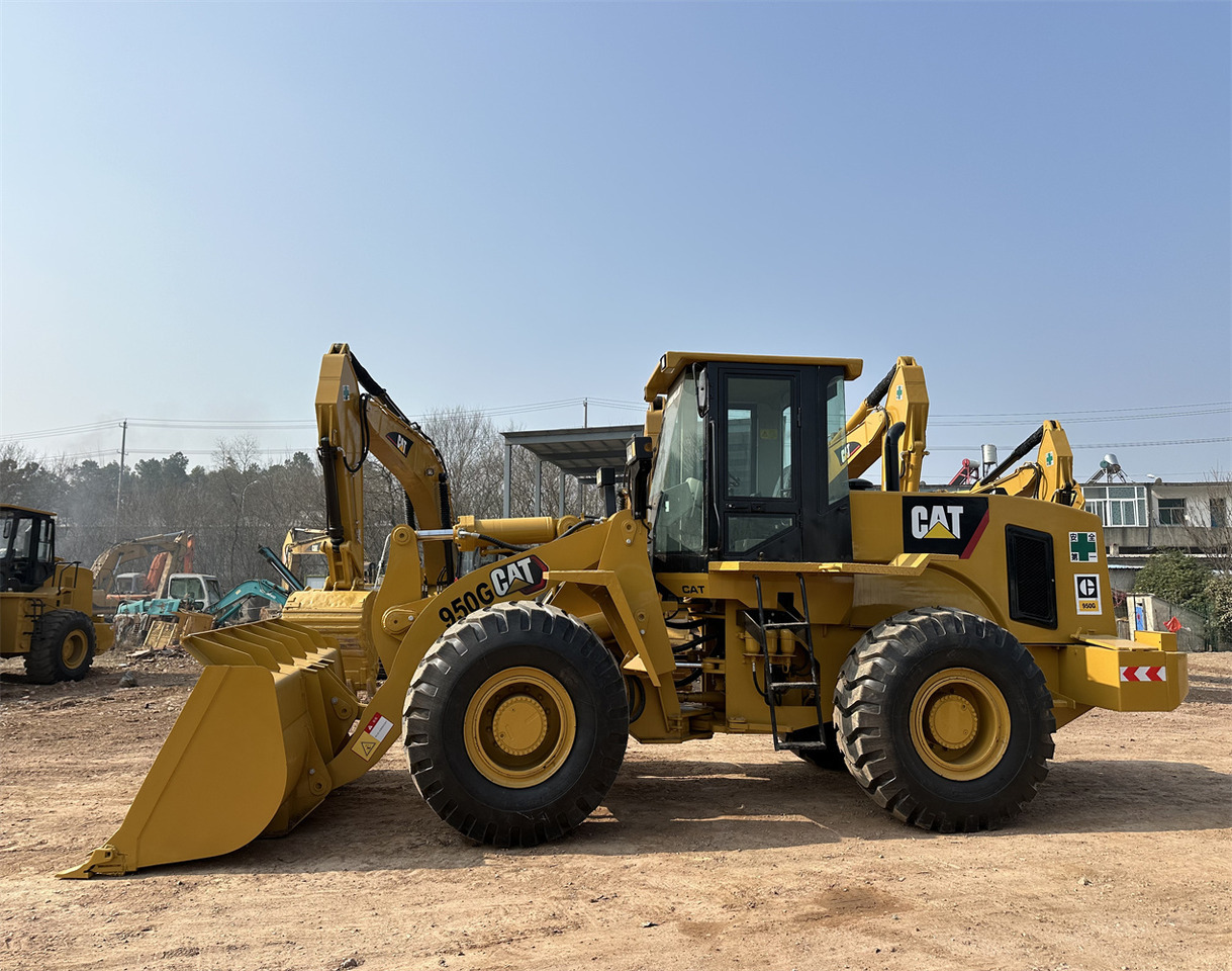 CATERPILLAR 950G - Gumikerekes homlokrakodó: 4 kép. CATERPILLAR 950G - Gumikerekes homlokrakodó: 4 kép.