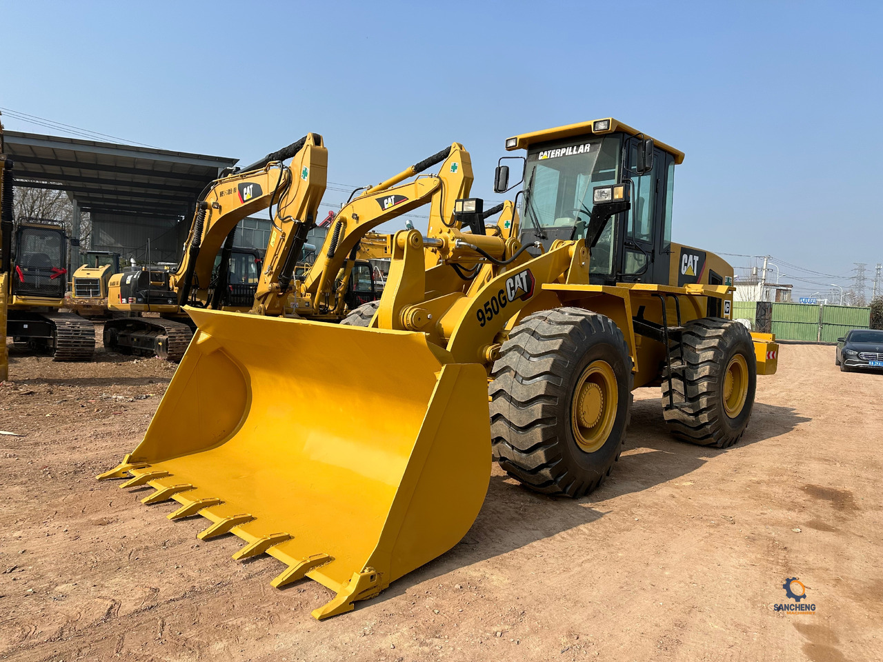 CATERPILLAR 950G - Gumikerekes homlokrakodó: 4 kép. CATERPILLAR 950G - Gumikerekes homlokrakodó: 4 kép.