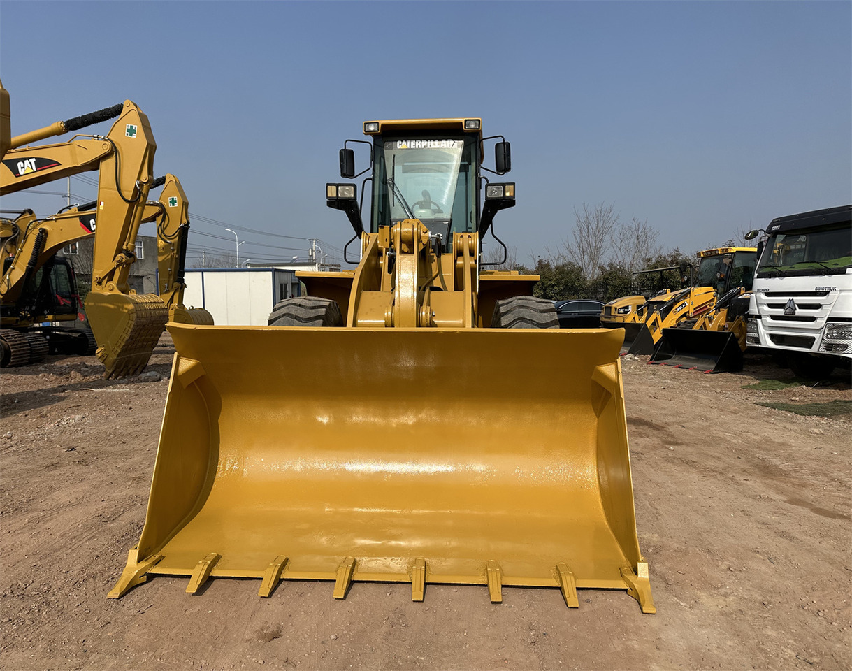 CATERPILLAR 950G - Gumikerekes homlokrakodó: 4 kép. CATERPILLAR 950G - Gumikerekes homlokrakodó: 4 kép.