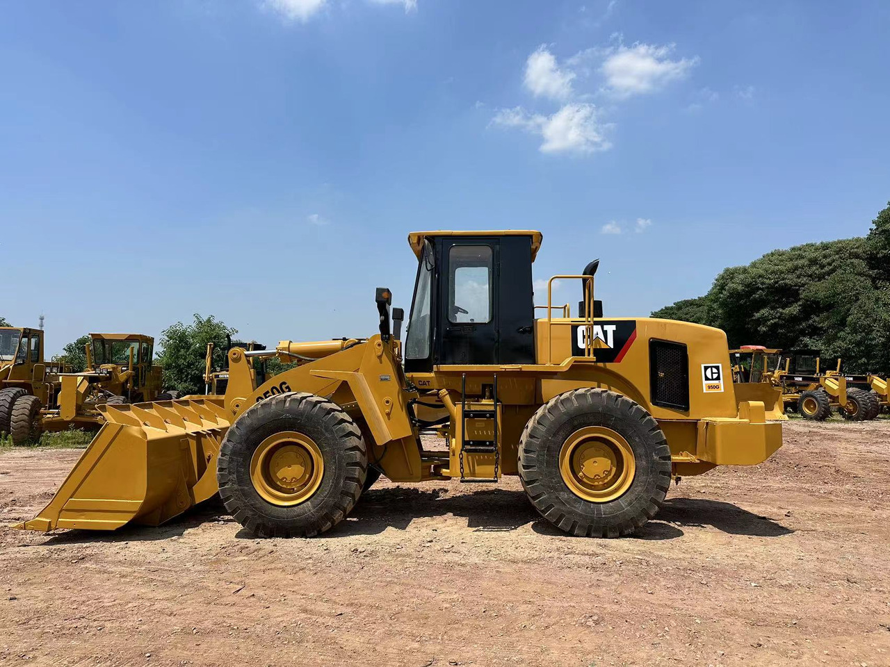 CATERPILLAR 950G - Gumikerekes homlokrakodó: 4 kép. CATERPILLAR 950G - Gumikerekes homlokrakodó: 4 kép.