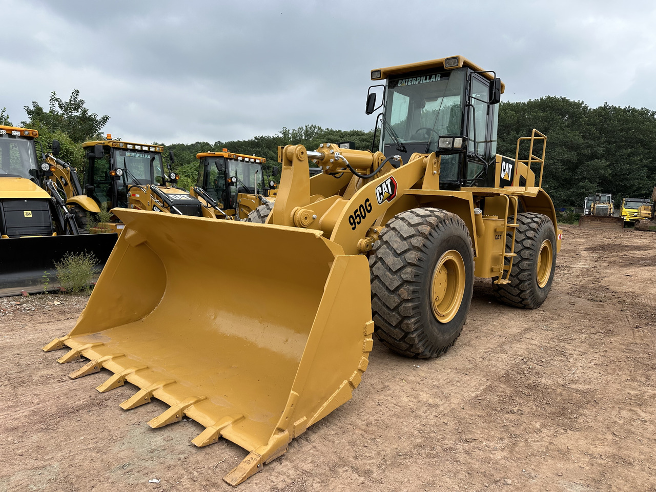 CATERPILLAR 950G - Gumikerekes homlokrakodó: 5 kép. CATERPILLAR 950G - Gumikerekes homlokrakodó: 5 kép.
